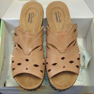 Clarks Tan Leather Mules with Cutout Design